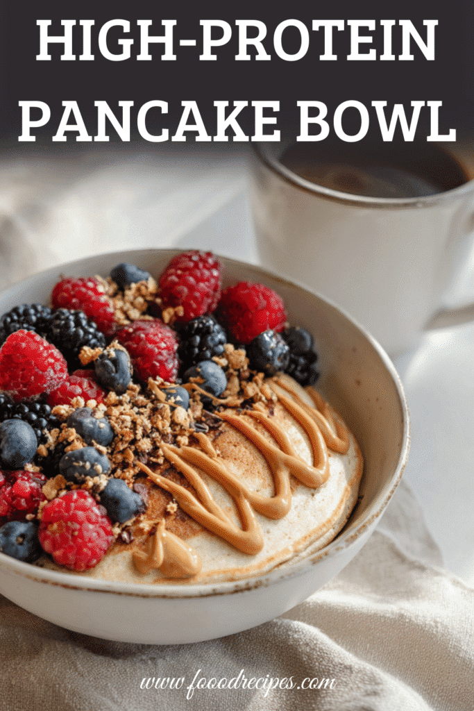 High-Protein Pancake Bowl Meal Prep topped with berries and peanut butter