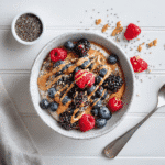 Protein pancake bowl with fresh berries and almond butter