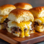 Philly Cheesesteak Sliders with melted cheese