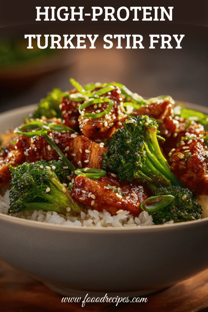High Protein Turkey Stir Fry with Broccoli served over rice with sesame seeds and green onions